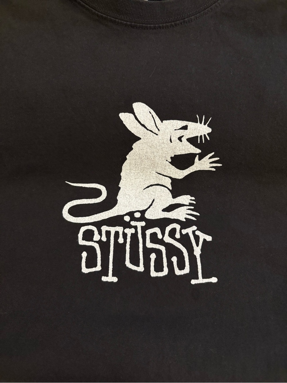 Stussy Black Tee with White Logo Tag and Graphic